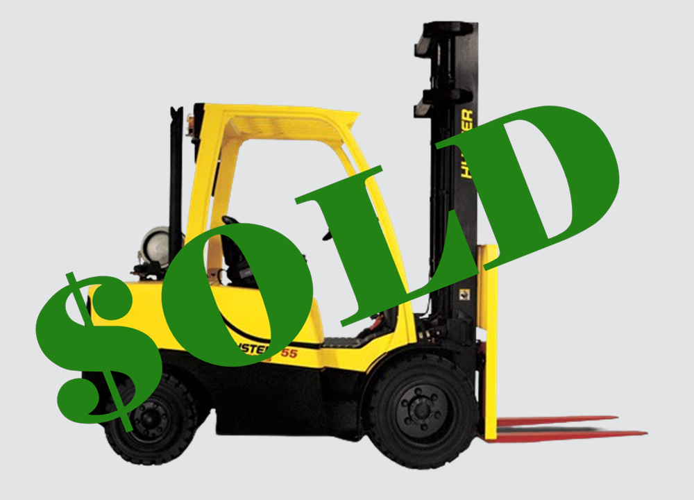 yellow forklift with green sold